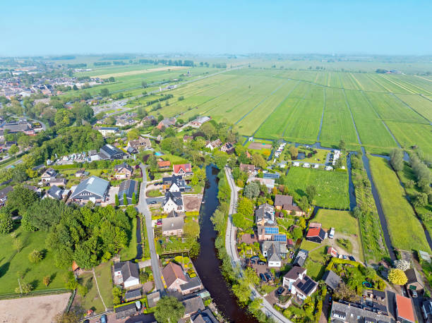 istock Aerial from a typical dutch landscape with a tiny river the Giessen and  a camp space in the Netherlands 2153545719