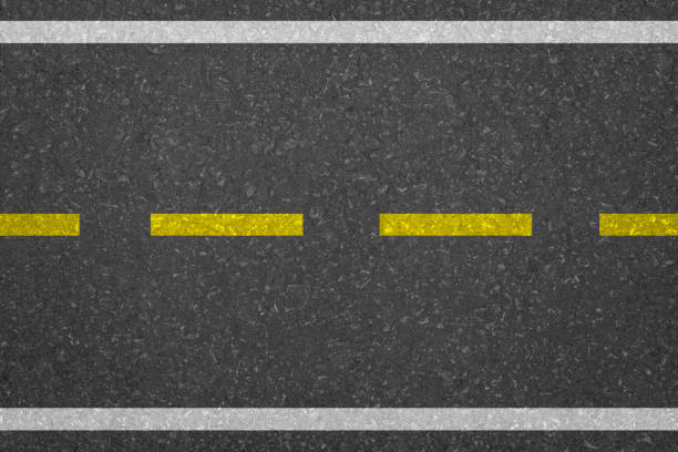 istock Yellow Line On Asphalt Road texture 2153546903