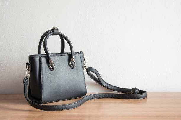 leather bag is placed on a wooden floor