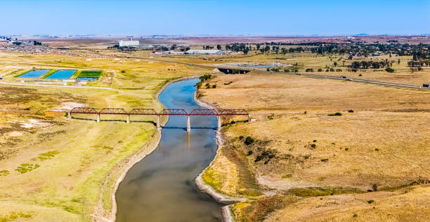 Villiers with the Vaal river which borders with the Free State seen on the N3 highway travelling from Durban to Johannesburg.