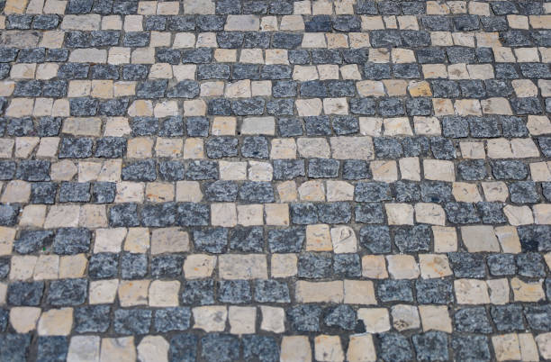 istock Background image formed by rows of white and black stones 2153548827