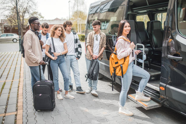 istock A group of friends board a bus, they are going on a joint trip 2153556934
