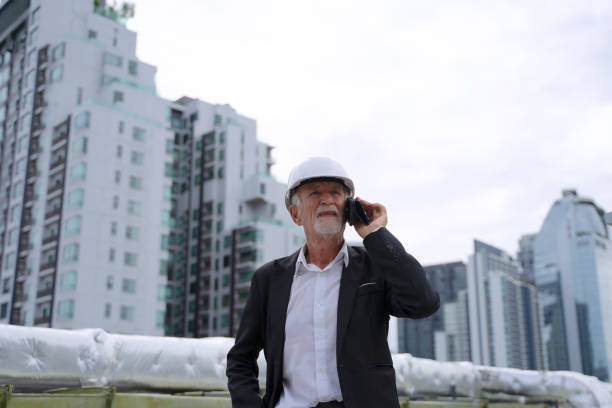 istock Engineer is working on the rooftop of high rise building. 2153557893
