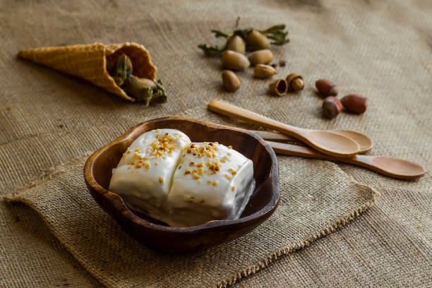 istock Vanilla vegan ice cream in bamboo bowl 2153557927