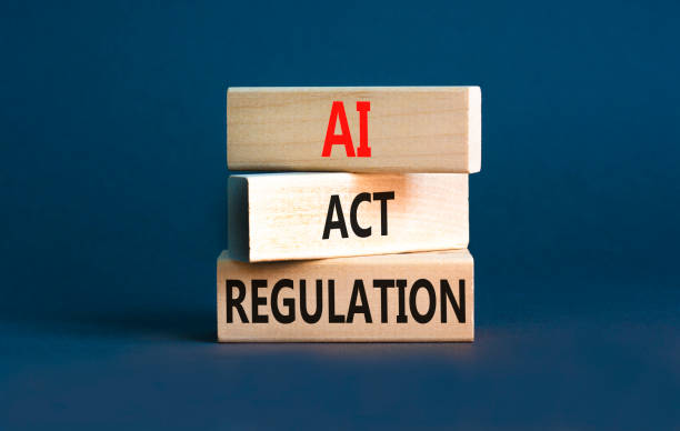 istock AI act regulation symbol. Concept words AI artificial intelligence act regulation on wooden block. Beautiful grey table grey background. Business AI act regulation concept Copy space 2153565003