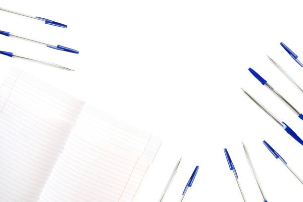 Notebook and notepad with pens isolated. Background on the theme back to school. Border.