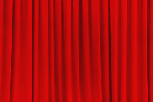 istock red theater curtain that dropped down as a straight line. Background for inserting text, empty spaces 2153567217