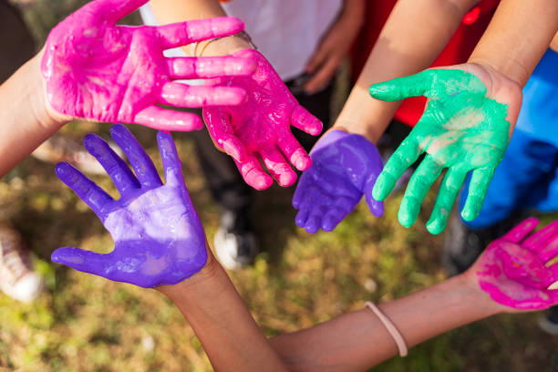 istock Kids hands colored in various colors. 2153570476