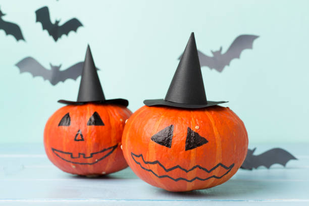 istock Halloween composition with jack o lanter decor on wooden table 2153571173