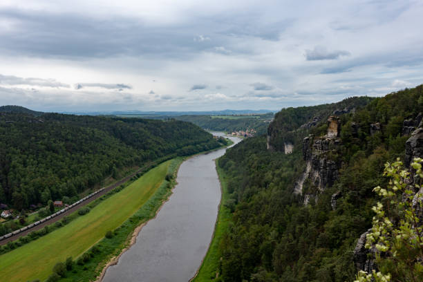 istock A river runs through a lush green valley 2153583827