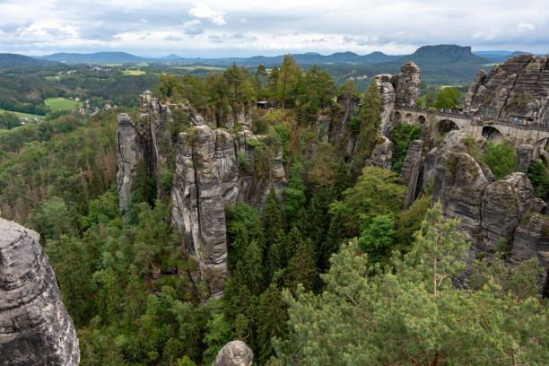 istock A mountain range with a forest on top and a road running through it 2153586507