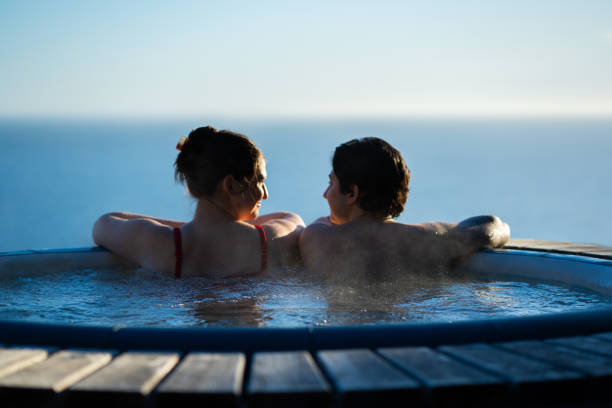 istock Defocused Queer Couple in a Hot Tub with a View 2153587181