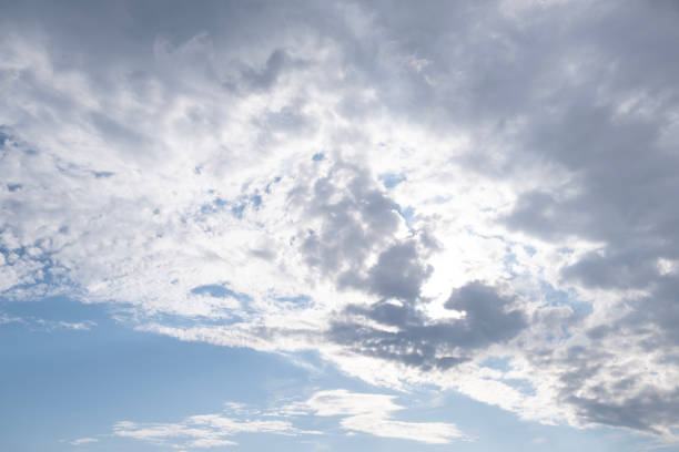 istock large dark blue gloomy cloud and sunlights 2153588125