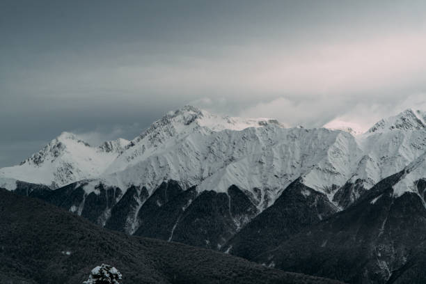 istock Sochi Mountain Peaks: Spectacular Foggy View with Beautiful Lighting 2153595080