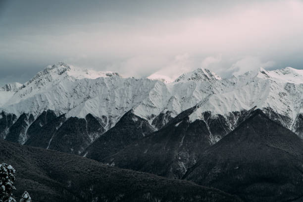 istock Sochi Mountain Peaks: Spectacular Foggy View with Beautiful Lighting 2153595241
