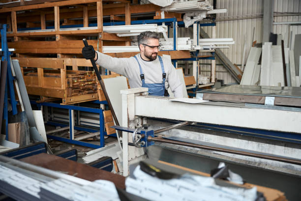 istock Man forms a bend of an aluminum profile 2153595861