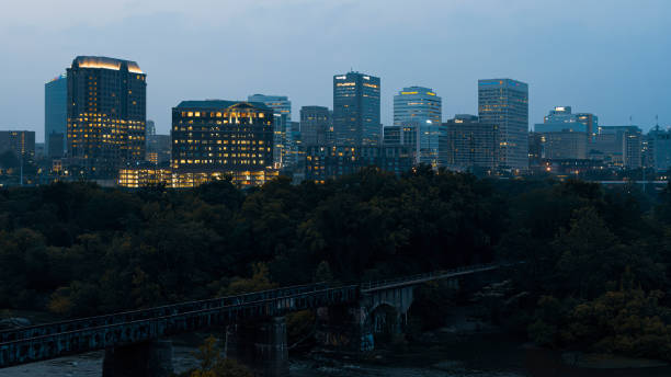 istock Night smog thickens over river bridge in Richmond Downtown. Riverside on James River, VA 2153598298