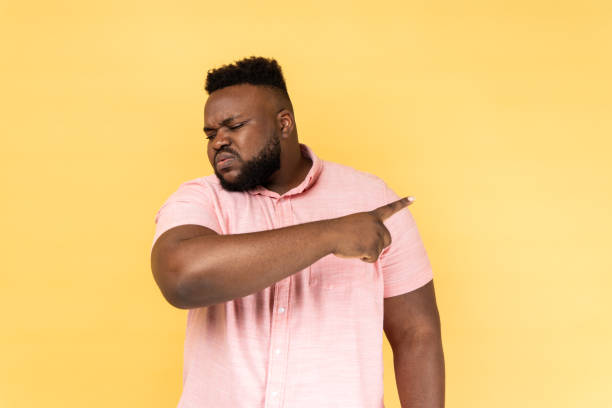 istock Man pointing finger aside, ordering get out and looking resentful, boss dismissing from work. 2153598996