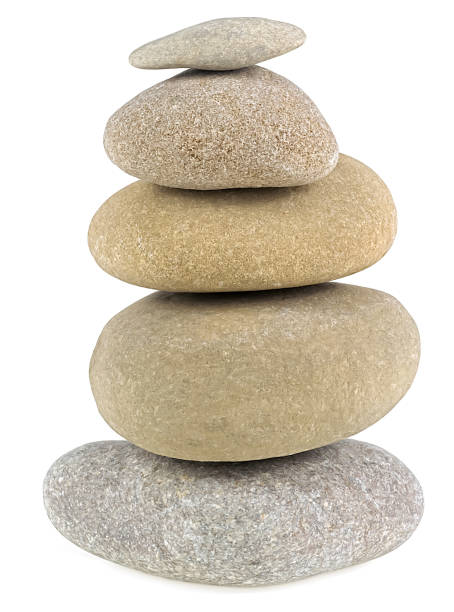 istock Stack of balanced pebble stones isolated on a white background. Sea stones. 2153603326