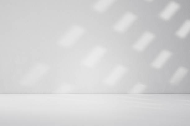 istock Wall interior background, studio and backdrops show products.with shadow from window color white . background for text insertion and presentation product 2153605065