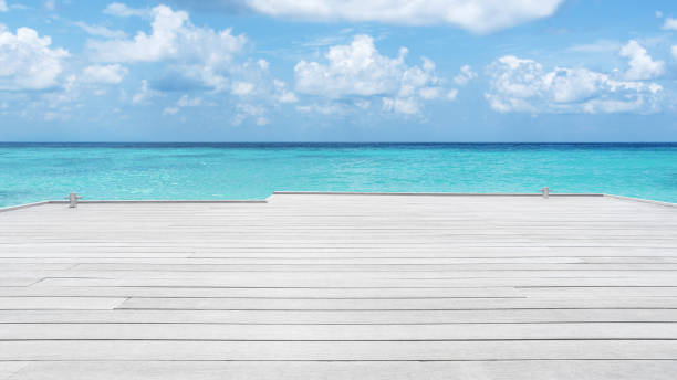 istock Wooden jetty on turquoise sea 2153607587