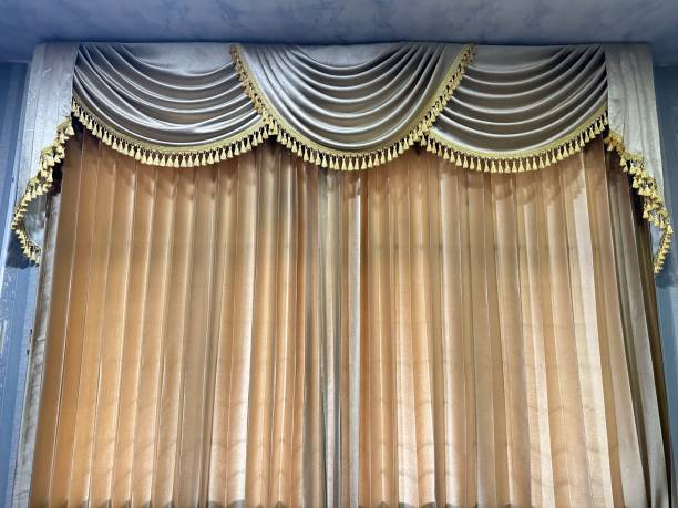 istock golden yellow curtains 2153607612