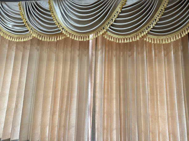 istock golden yellow curtains 2153607753