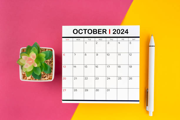 istock White calendar for October 2024 and pen on beautiful background. 2153608507
