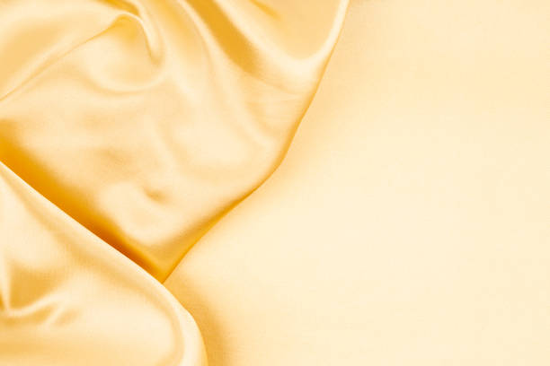 istock The Gold Satin background textured 2153608545
