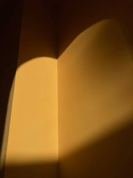 istock Abstract yellow geometric architectural forms. Modern buildings in the sun with deep shadows. 2153611189
