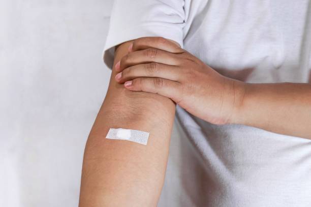 istock concept of blood donor, showing injection marks 2153619464