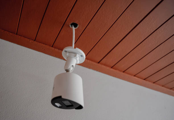 istock A technician installs a CCTV camera in a modern apartment. 2153622256