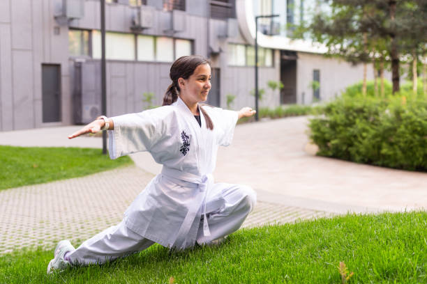 istock young girl in a white kimono, karate 2153623586