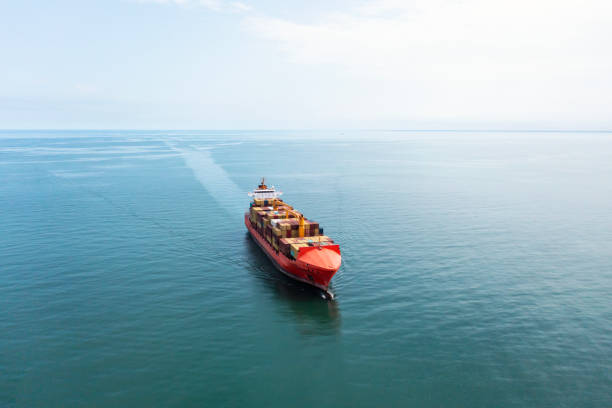istock Aerial top view of container cargo logistic ship in transit in the ocean. 2153624639