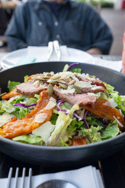 istock Delicious Beef salad on a table ready to be eaten at a restaurant. 2153625087