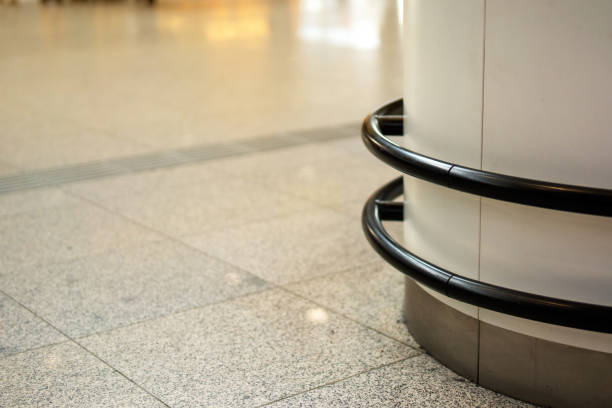 istock Metal pipes encircle a column, forming a protective barrier 2153625488