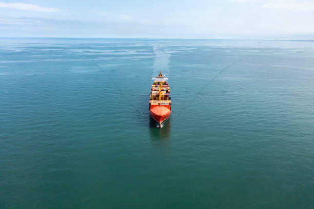 istock Aerial top view of container cargo logistic ship in transit in the ocean. 2153625771