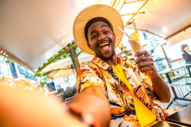 istock Tourist taking a selfie eating ice cream in a terrace 2153628002