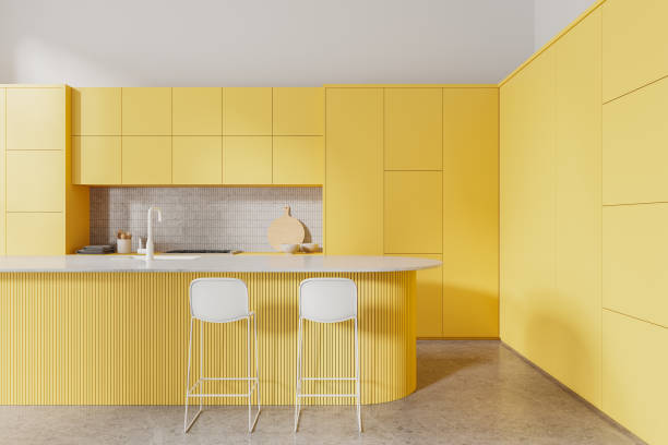 istock White and yellow kitchen interior with island 2153634589