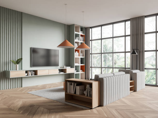 istock Green living room corner with couch and TV 2153635252
