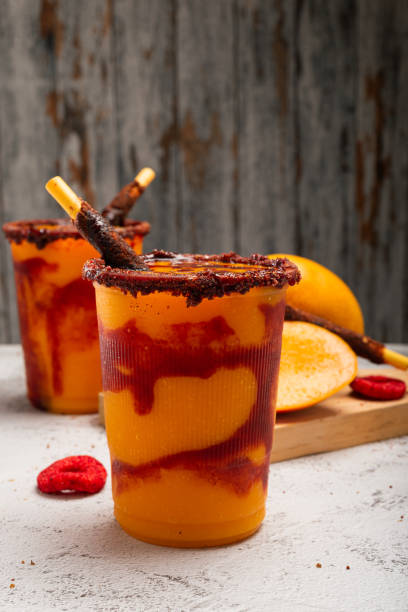 istock Mangonada, typical mexican mango smoothie with chamoy sauce and lime juice. 2153636297