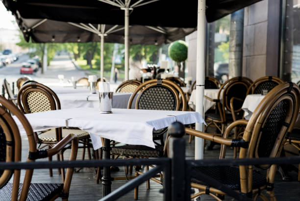 istock Empty cafe with terrace with tables and chairs. 2153636682