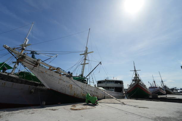 Makassar, Indonesia - May 18 2024: A wooden ship docked in the harbor