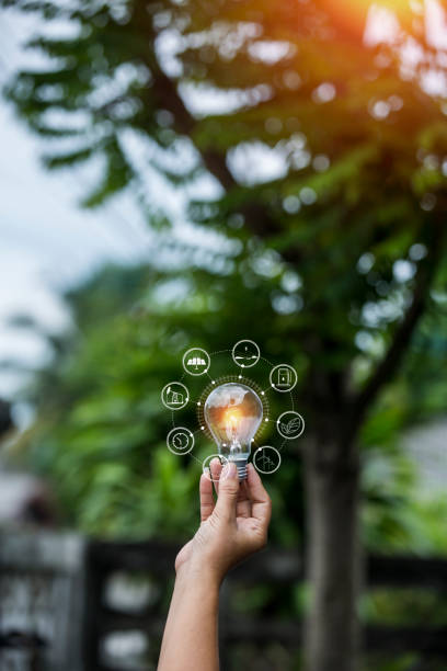 istock light bulb against nature, icons 2153637566