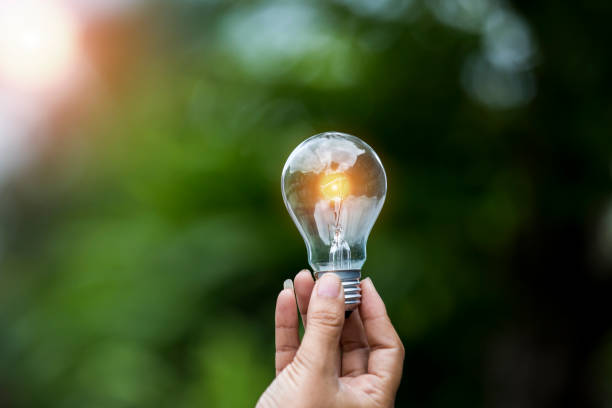 istock light bulb against nature, icons 2153637569