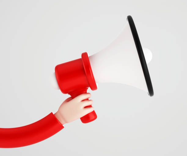 istock Cartoon hand holding a red megaphone on white background 2153640033