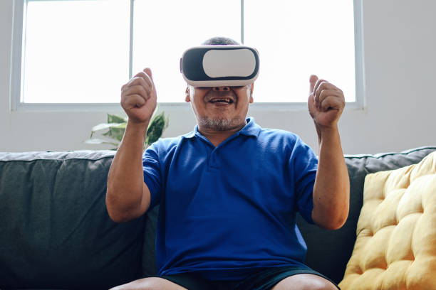istock Senior Man Enjoy Playing Games 2153641929