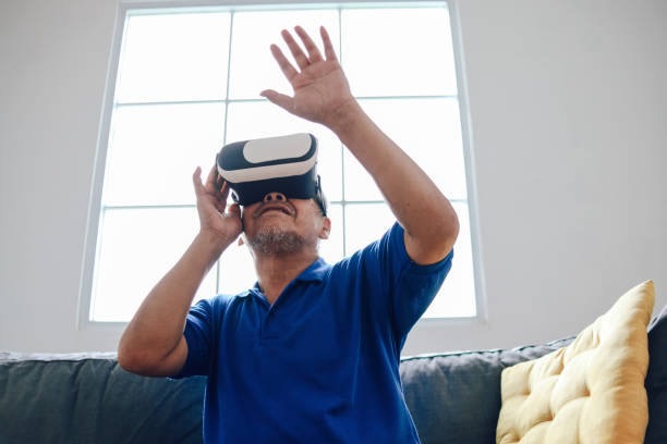 istock Senior Man Enjoy Playing Games 2153641941
