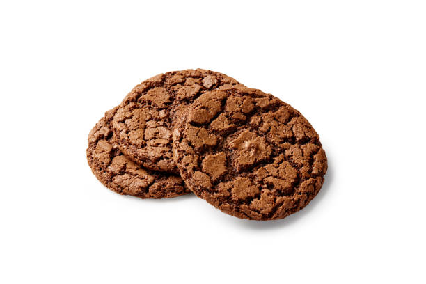 istock Classic crunchy chocolate sugar cookies isolated on white 2153649956