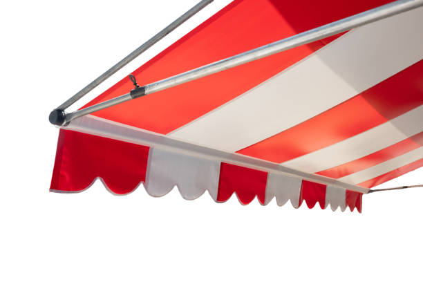 A red and white striped awning with a white trim. white awning canvas.